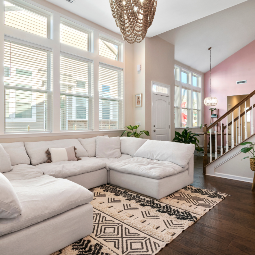 Create a modern and inviting seating area with a sleek sectional sofa