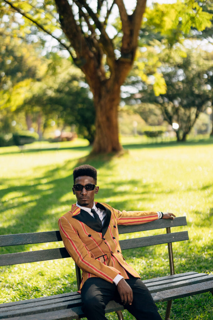 A model shows off a Suit by John Mark Mukasa with Kikoyi a Ugandan fabric